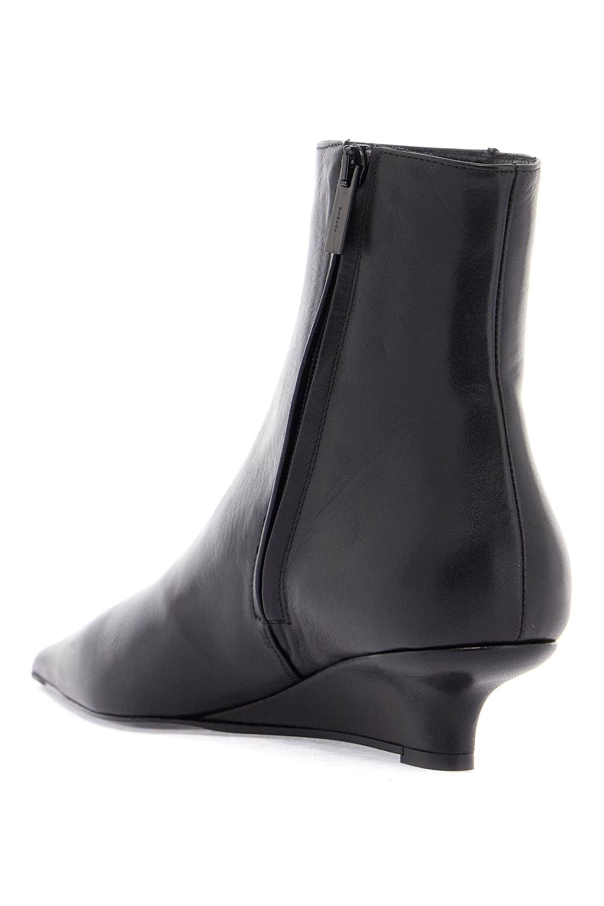 Toteme elegant and modern black leather ankle boots with zip